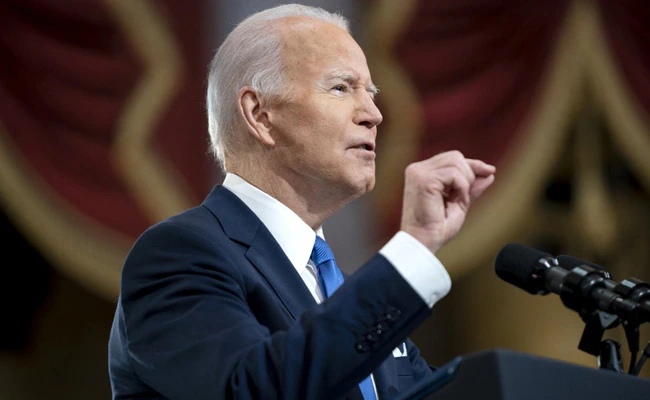 Biden condemns Trump’s ‘web of lies’ a year on from deadly Capitol assault