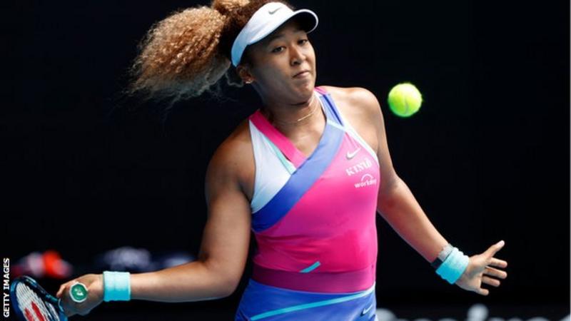 Australian Open: Naomi Osaka starts title defence with dominant win