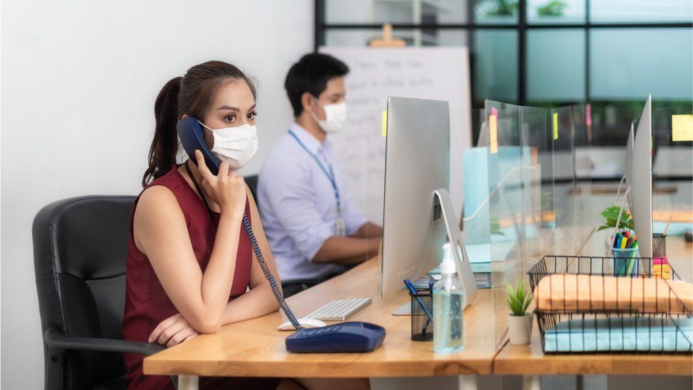 Return to the office begins as restrictions axed