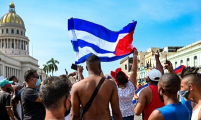 Cuba says more than 700 charged over anti-government protests