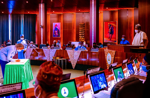 Buhari swears-in six new INEC Commissioners