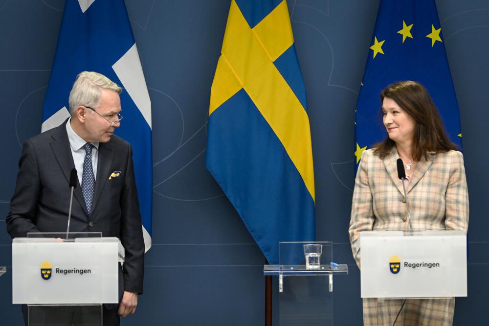 Neutral Finland, Sweden warm to idea of NATO membership