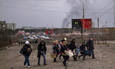 People flee embattled Ukrainian cities along safe corridors