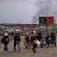 People flee embattled Ukrainian cities along safe corridors