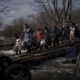 Ukrainians flee some besieged cities as conditions worsen
