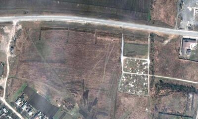Possible mass graves near Mariupol as Russia attacks in east