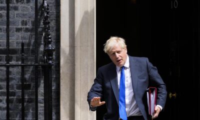 UK’s Johnson battles to stay in job after top ministers quit