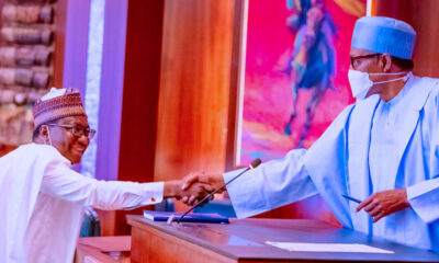 Buhari Swears-In New RMAFC Chairman