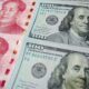 China’s yuan slides to 14-year low against US dollar