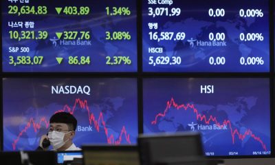 Global stocks lower amid British political turmoil