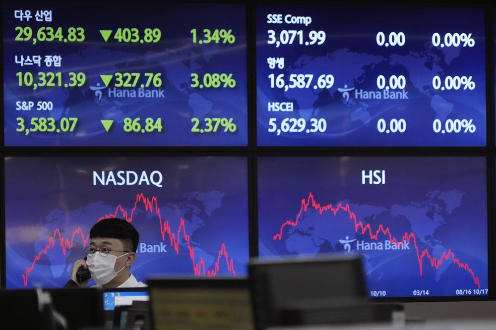 Global stocks lower amid British political turmoil