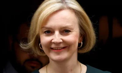 UK PM under pressure from own MPs to rethink tax cuts