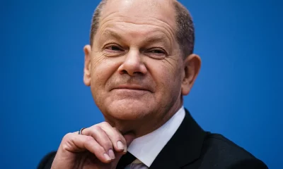 German chancellor’s China visit sparks controversy